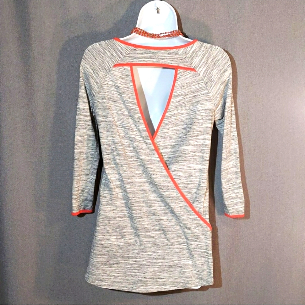 Criss Cross open back shirt size XS